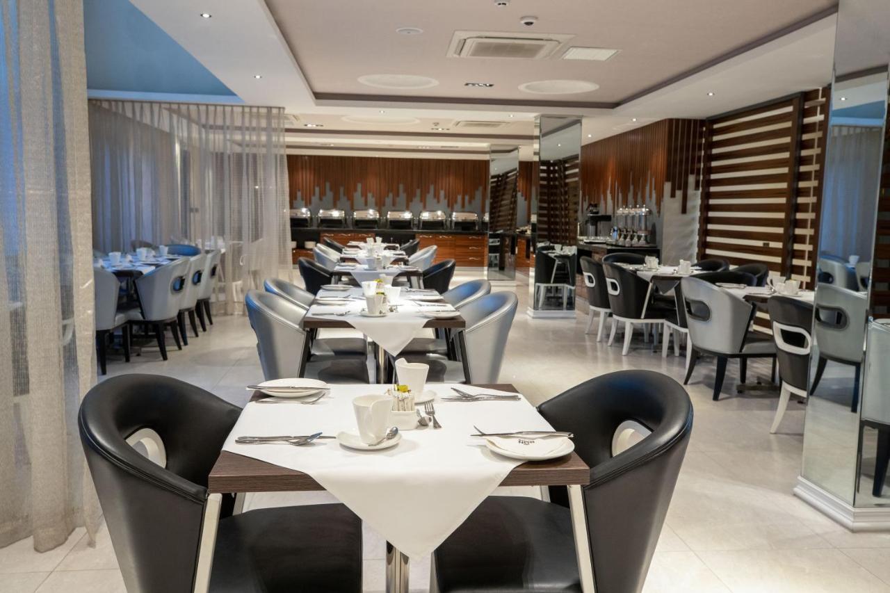Bon Hotel Tripod Оверри Экстерьер фото